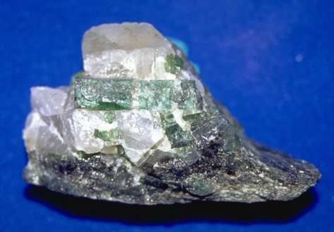 Emerald in quartz vein cutting utlramafic biotite schist
