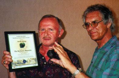 Orville Delong holding the certificate