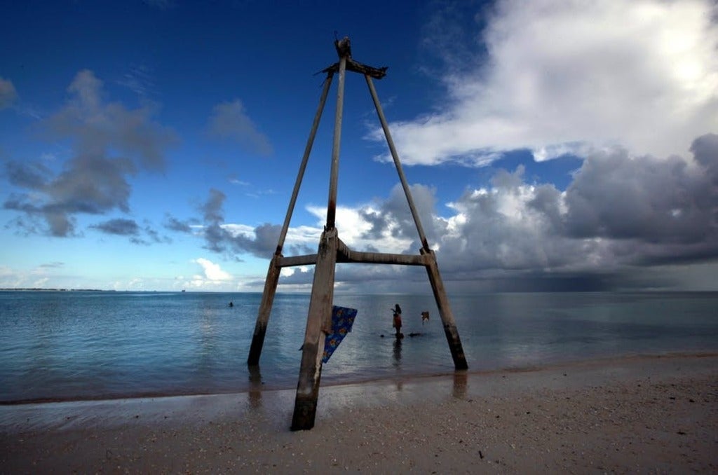 This wood tower on Bikeman islet, in the central Pacific island nation of Kiribati, used to be on the sand. 