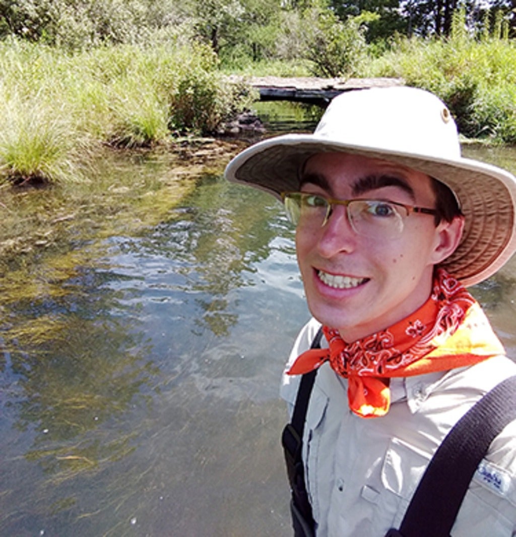 Photo of Tyler Hampton in the field