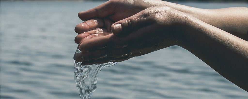 Water flowing through hands