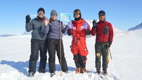 Christine Dow and colleagues on top of glacier 