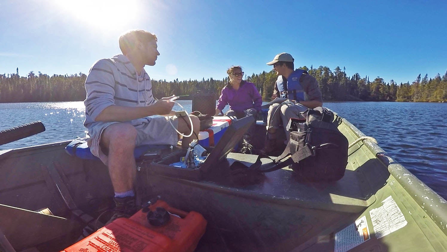 boreal lake students in boat