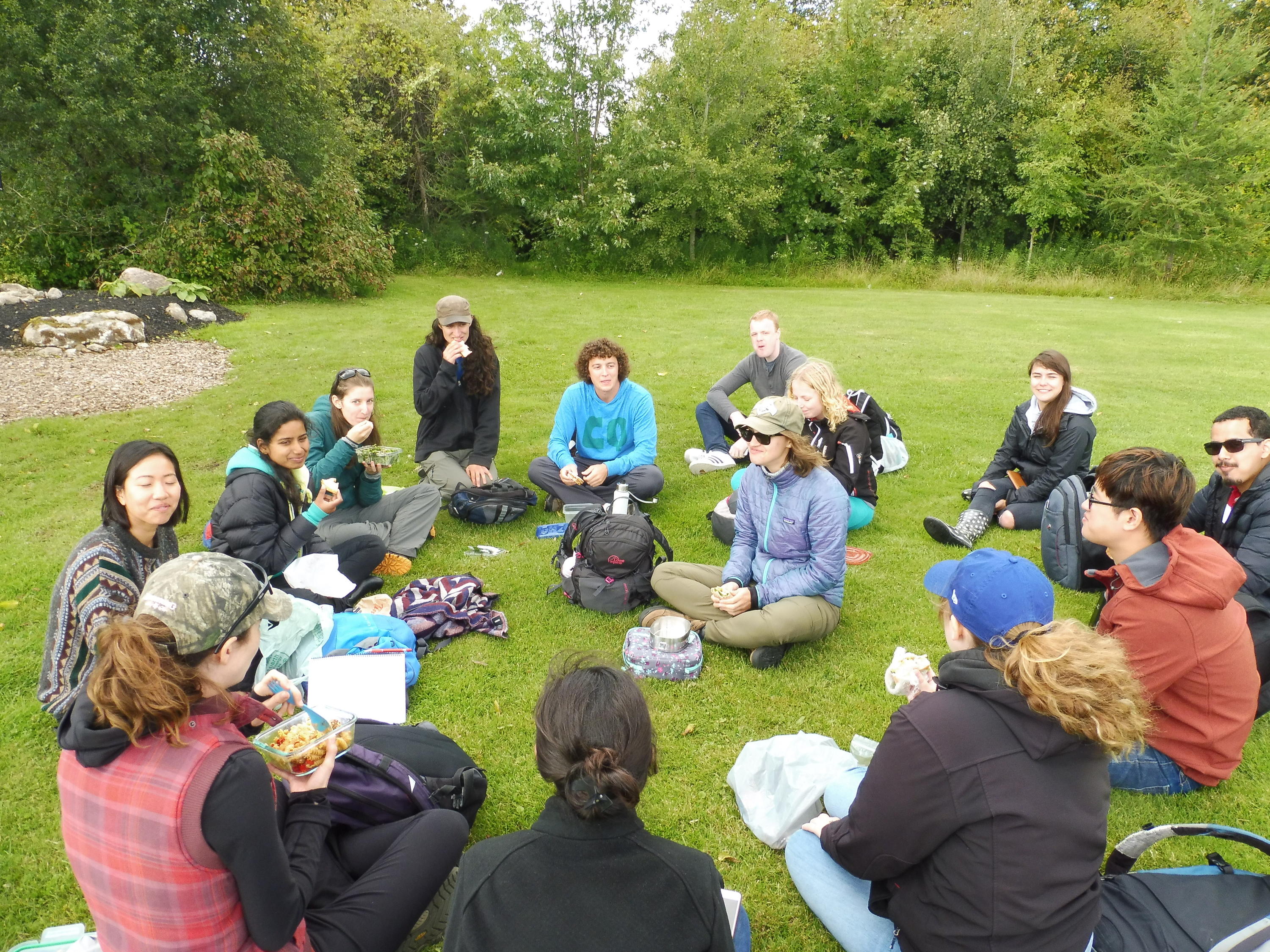 students learning in circle at the Grand River Watershed