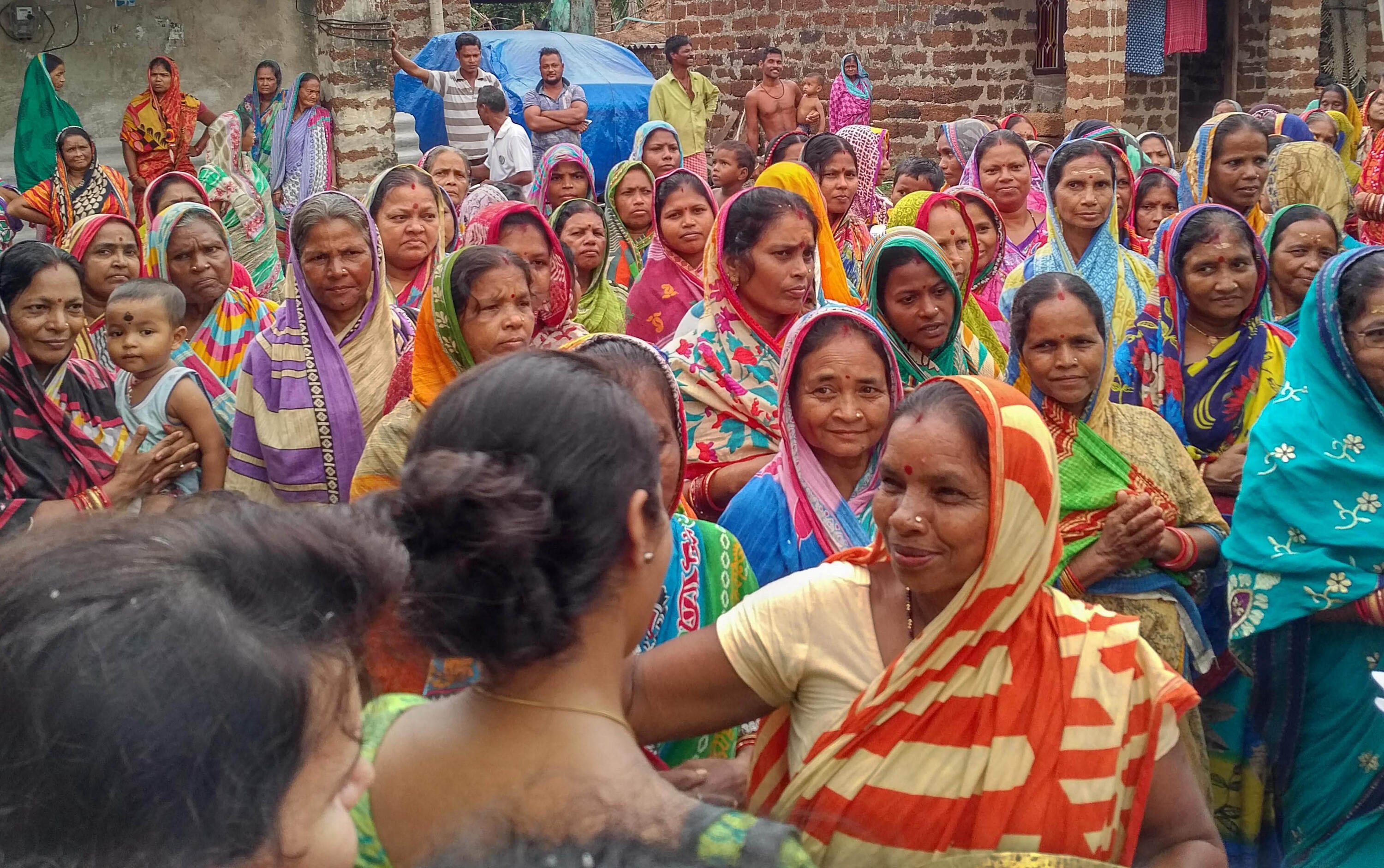 Village women welcoming researchers