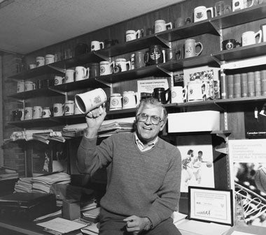 Carl Totzke with his mug collection