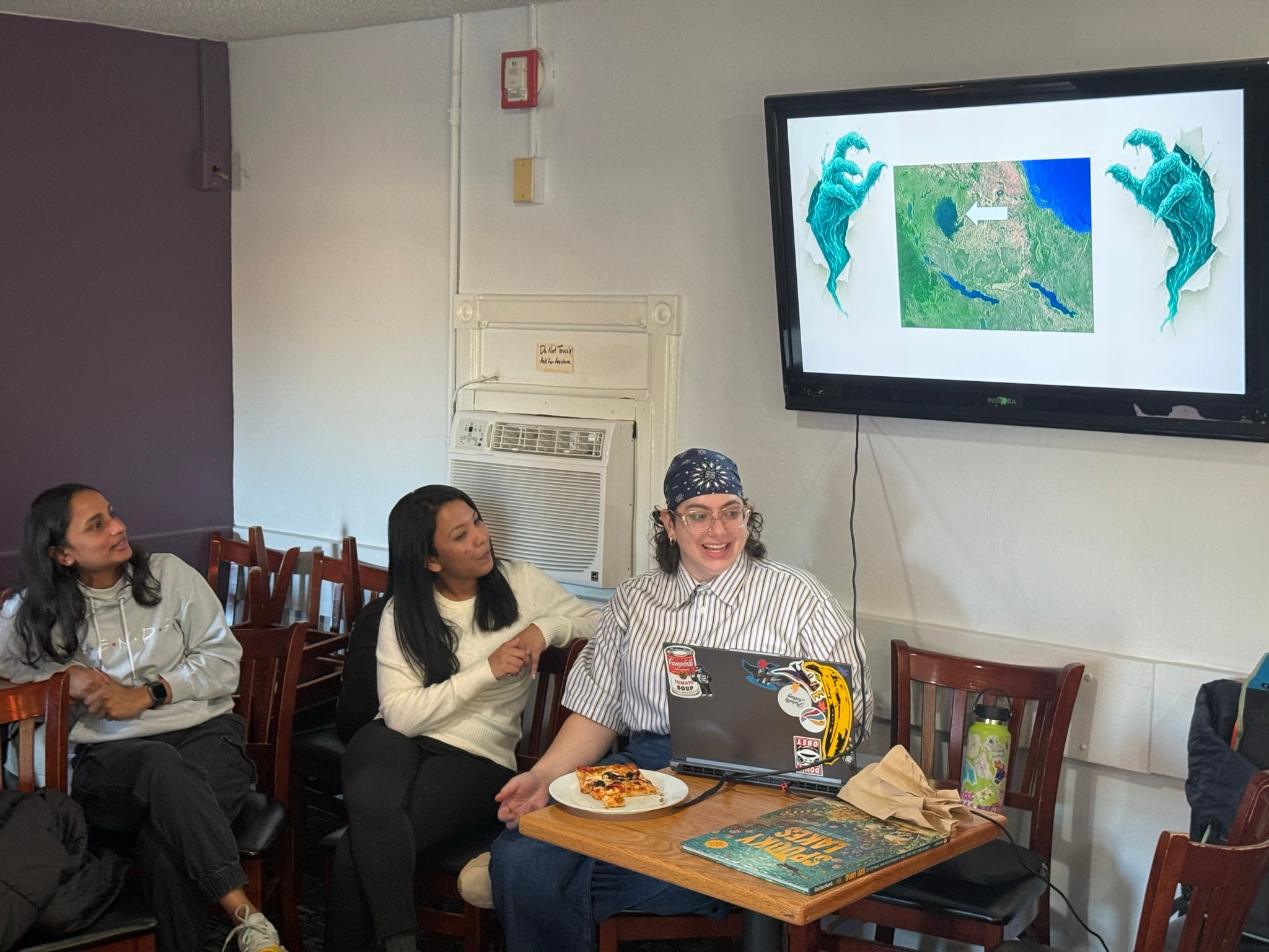 One of the trivia questions features a map view of a lake