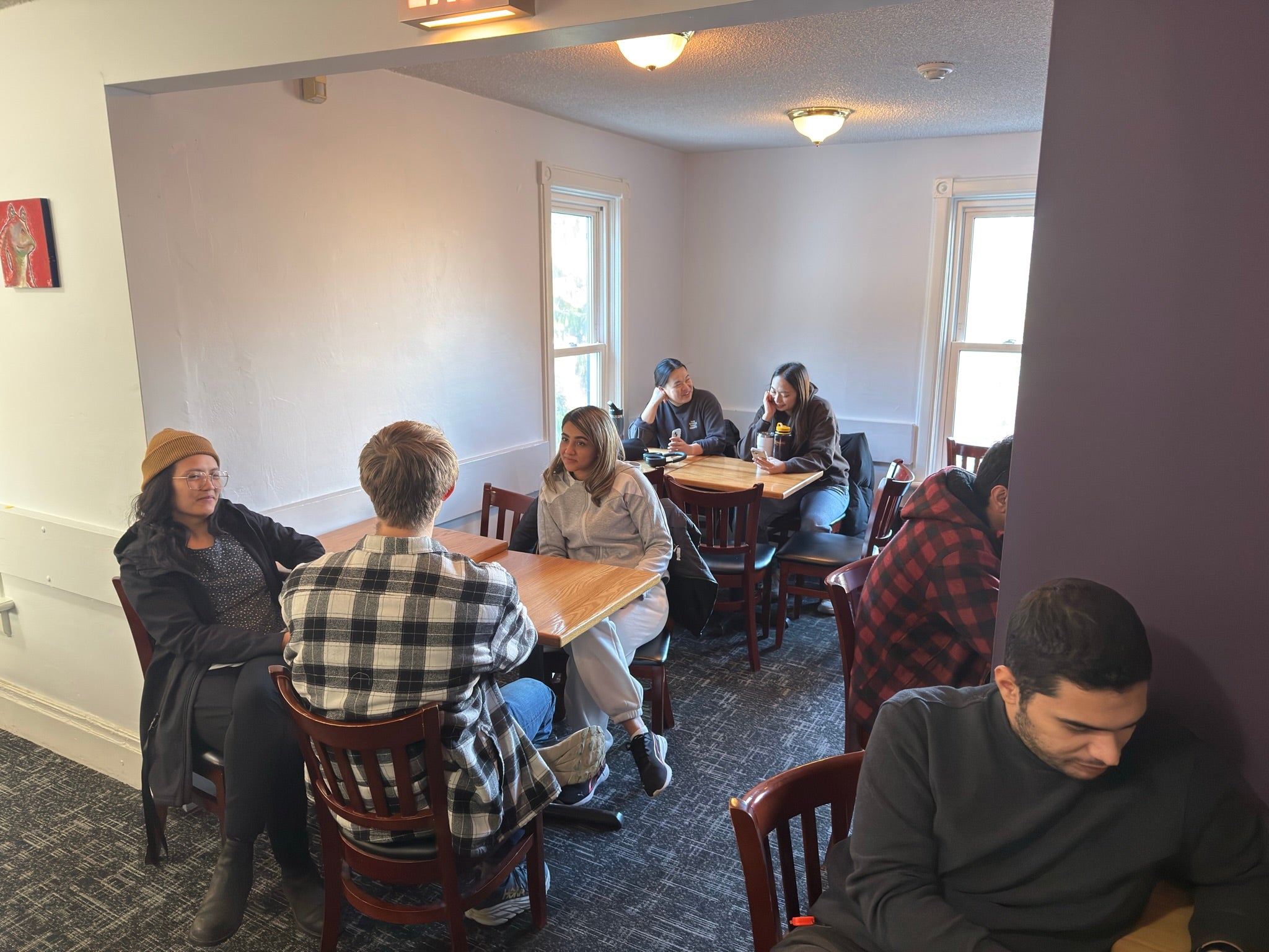 Attendees gather at the Halloween trivia night