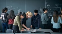 Students working within a classroom