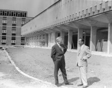 Doug Wright stands with colleague outside of Engineering 2