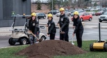 Engineering Groundbreaking - Feridun and Peal with students