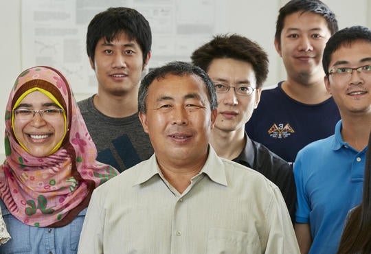 Waterloo Engineering professor Xuemin (Sherman) Shen with graduate students