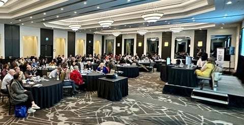 audience members listening to a lecture