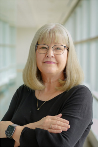Patricia Hrynchak smiling at camera