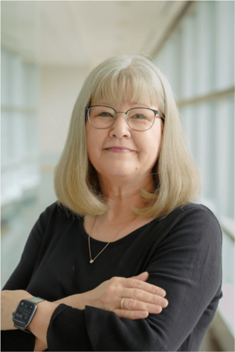 Patricia Hrynchak smiling at camera