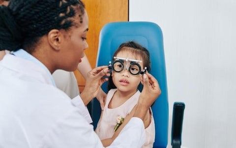 Child having her vision tested