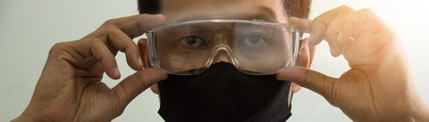 person wearing safety glasses