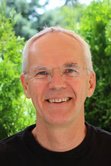 Dr. Riemer A. Faber smiling in a headshot