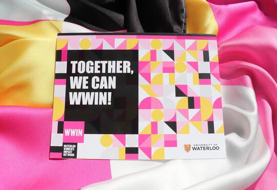 WWIN scarf with mosaic pattern with pink, black, gold and white
