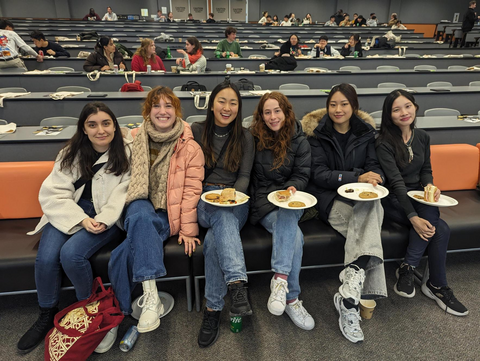 Students sitting with food