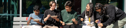 students eating outside