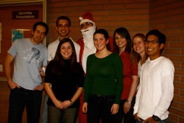 A group of students with Santa Claus