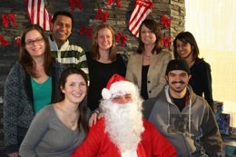 A group of students with Santa Claus.