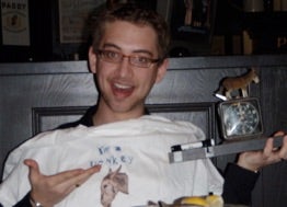 A student with the Swamp Donkey award and t-shirt.