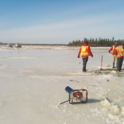  Power auger drill and researchers at Saline Fen ponds