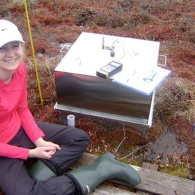 Researcher Shannon conducting gas fluxes