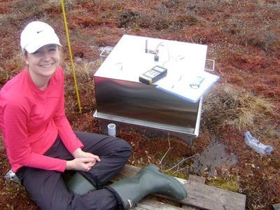 Researcher Shannon conducting gas fluxes
