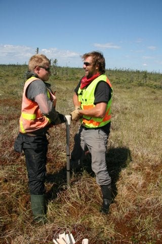  Scott Ketcheson and Tom Ulanowski retrieving peat core