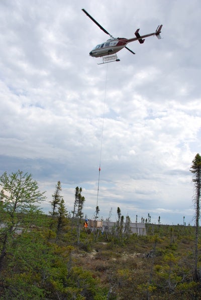 A helicopter dropping off supplies