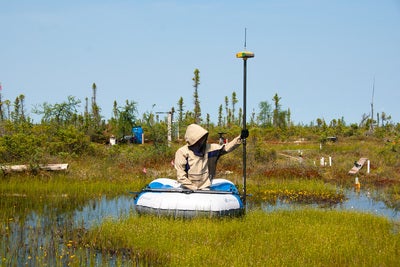 A researcher on a float with a DGPS device