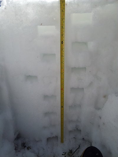  A snow pit and measuring tape