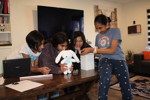 the four team members testing their sensor