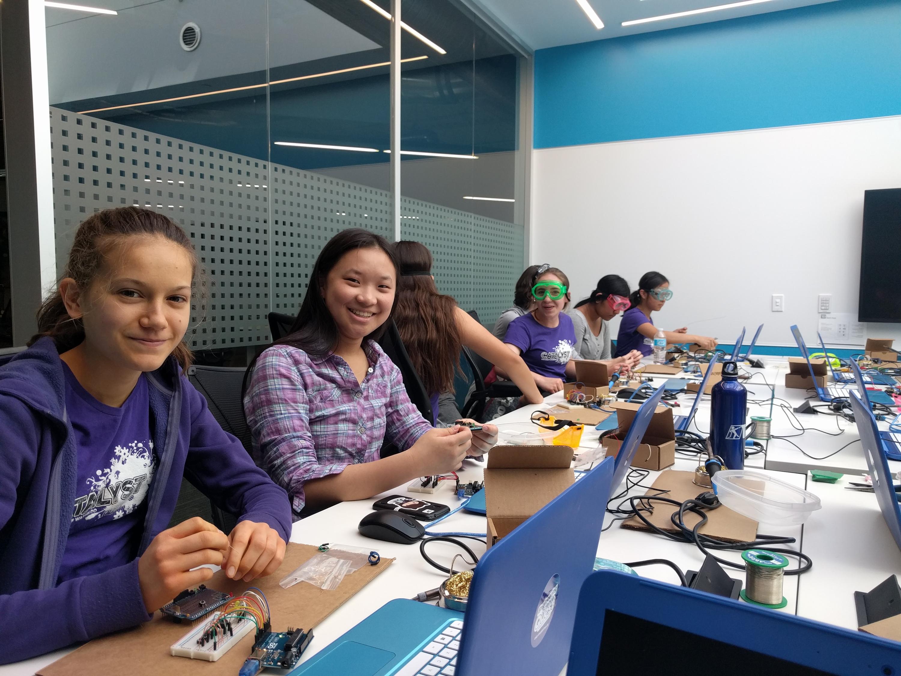students coding with arduino