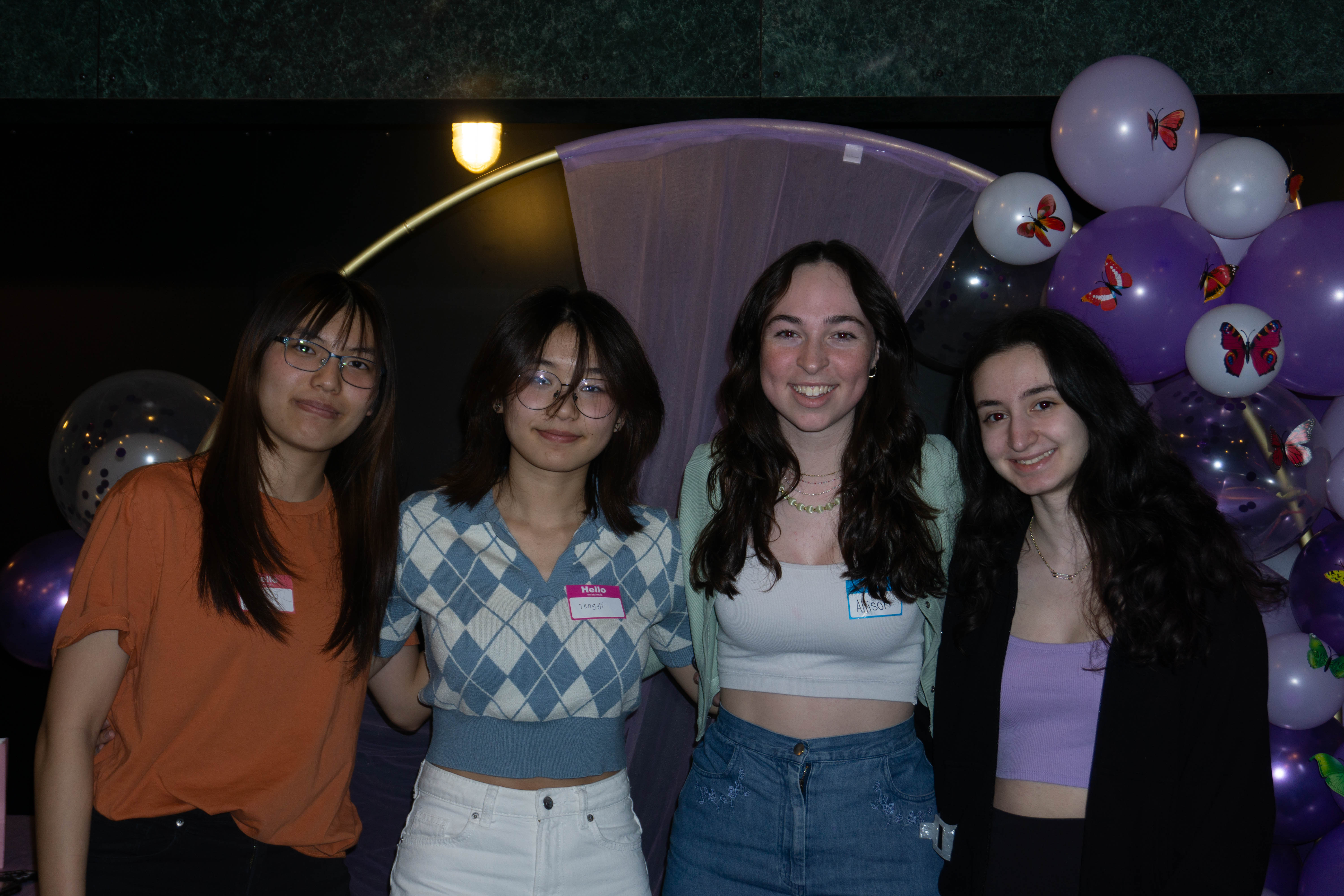 WoW participants posing at a photobooth