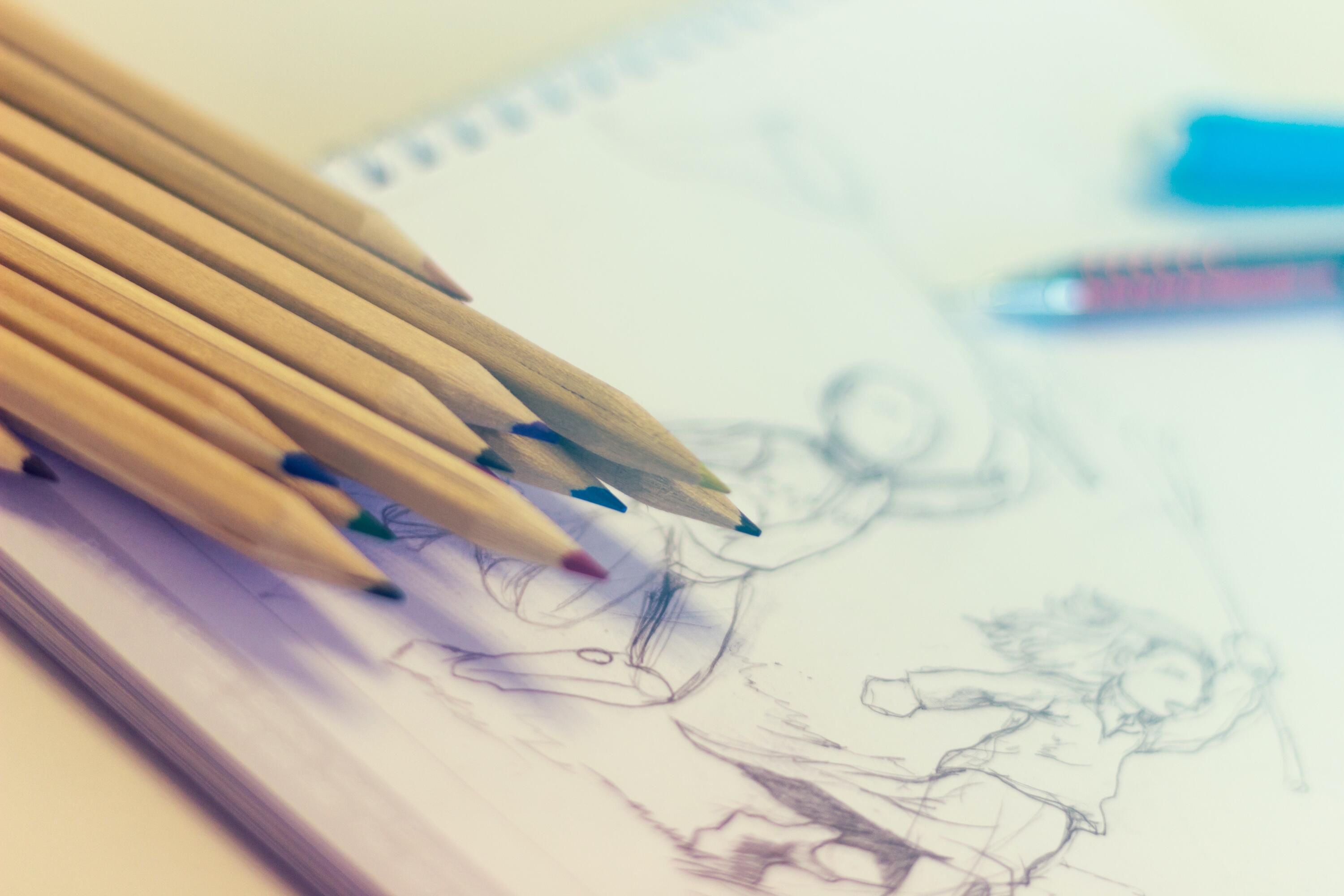 Close up image of pencils and artwork