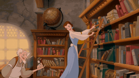 Video of Belle moving past a bookshelf full of novels.