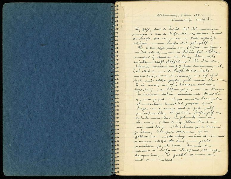 A picture of Etty's original diary, with her writing and a blue cover