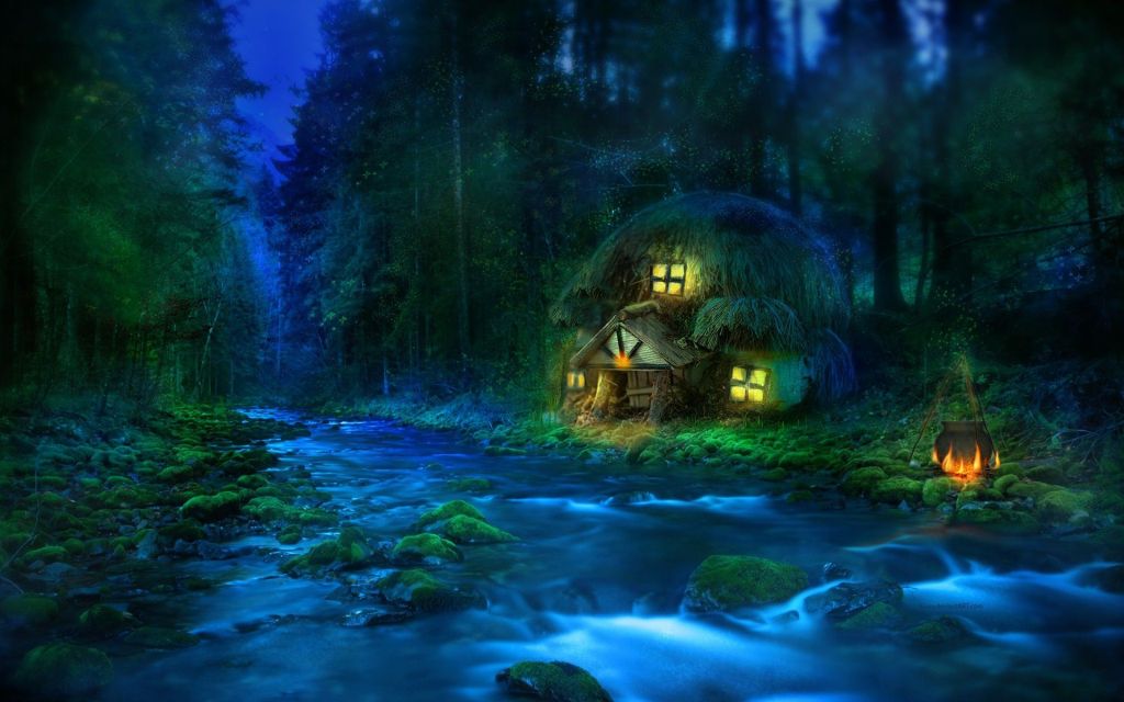 Cabin beside a river in the woods at night