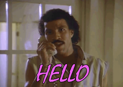 Gif of Lionel Ritchie singing Hello into a telephone