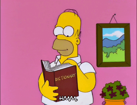 Homer Simpson flipping through a dictionary and saying 