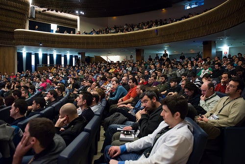 Image of a lecture hall full of people during RootedCON 2013