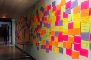 Our colourful Writing and Communication wall quilt decorates the SCH hallway