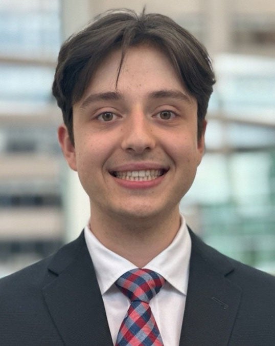 A headshot of Ian, member of the Intergenerational Council